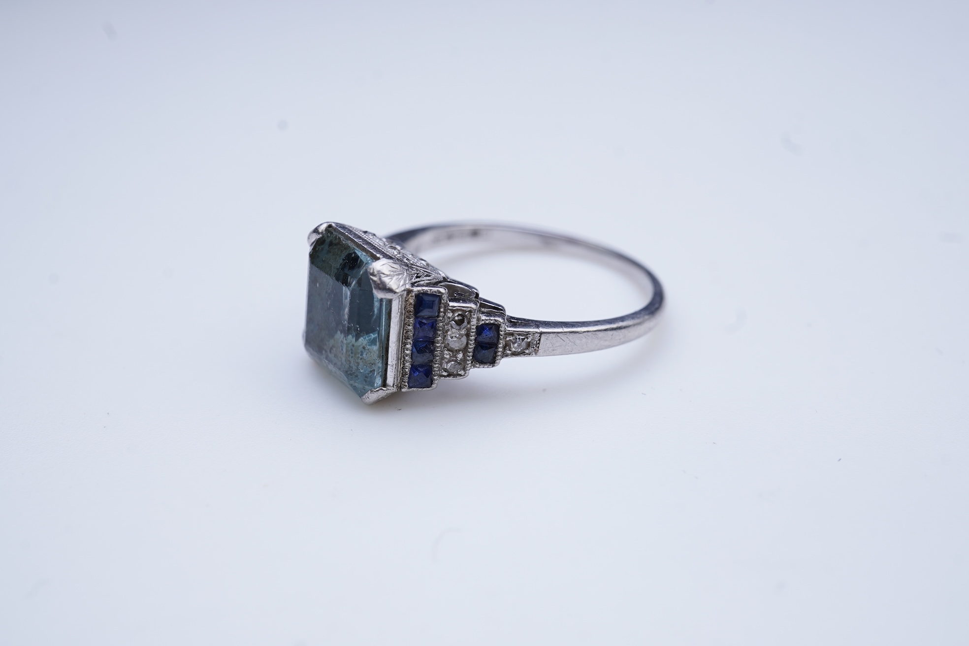 An aquamarine, sapphire and diamond ring
